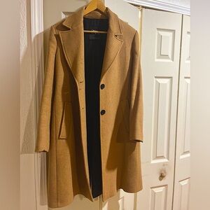 Hello! I am selling my Zara beige camel coat! Only worn a few times!